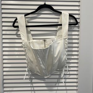 Off-white corset style top with tied sides